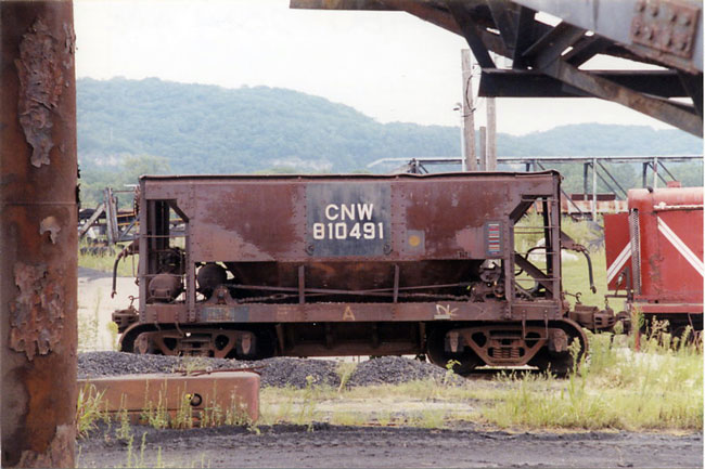 049.jpg.jpg - In his travels, Wally has spotted many freight cars still lettered CNW, this one at Prairie du Chien, Wisconsin in Aug. 2004.