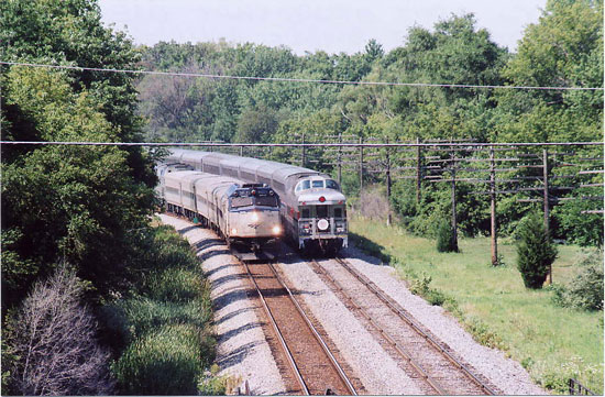 070.jpg - August 2007 at Sturtevant, Wisconsin.  The Empire Builder, Amtrak No. 7 with private car "Caritas," passes a Chicago bound Amtrak.  Now, how did Wally know this was going to happen?  Or, did he set it up??